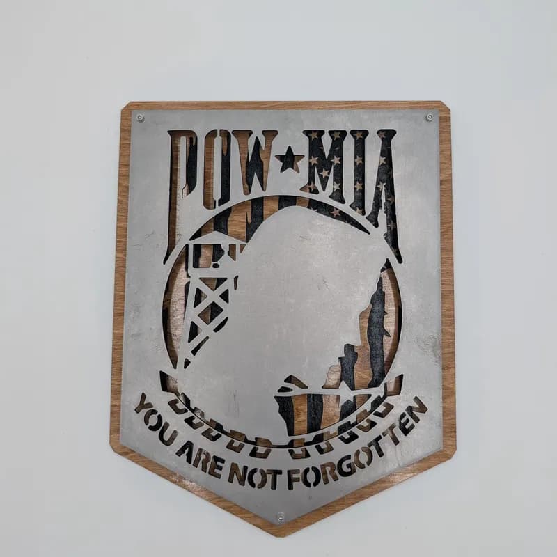 POW·MIA plasma-cut steel wall sign with wood backer