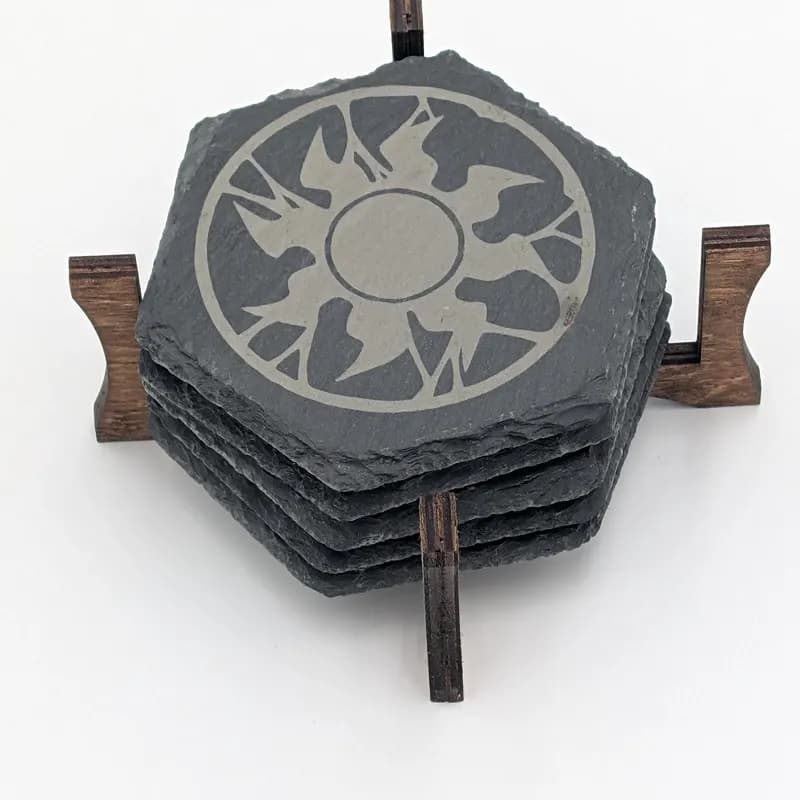 Laser-engraved slate coaster set with wood holder — MTG White Sun symbol
