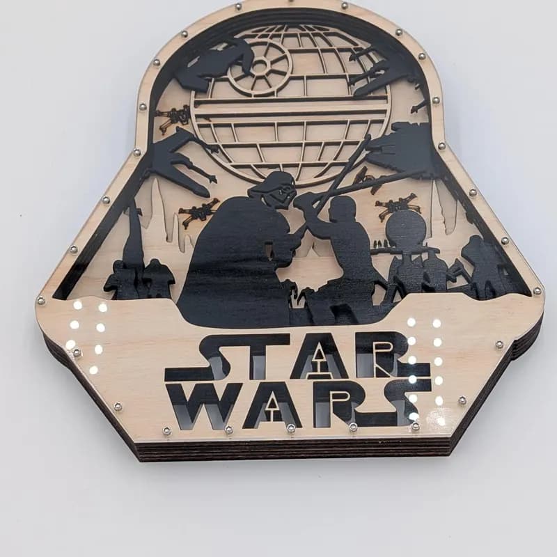 Star Wars multi-layer wood scene inside Darth Vader helmet silhouette