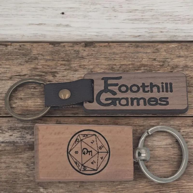 Laser-engraved custom wood keychains on reclaimed wood